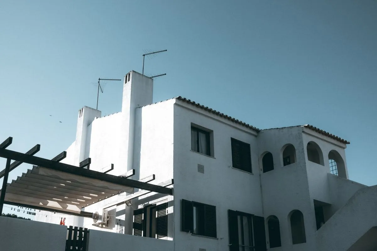 A white house on the cliff road